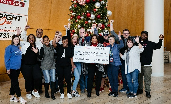 Philanthropy team members and radio partners from iHeartMedia celebrate raising $260,000 for Children's Hospital of Georgia.