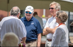 President Brooks Keel and MCG Dean David Hess talk to guests at 2022 President's Cookout.