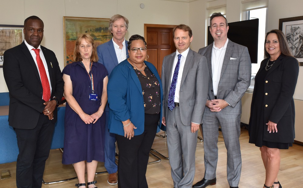 Gia Johnson, director of the Office of Protocol & Special Events stands among a group of Aberdeen University and Augusta University leaders during a visit to Scotland.