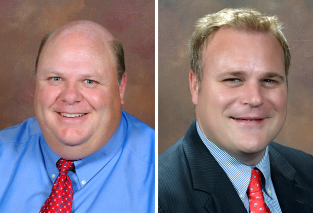 two men in red ties