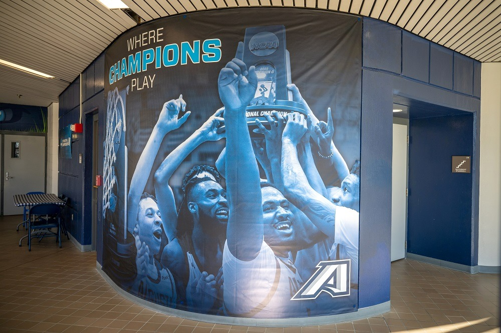 New wall graphics include championship basketball team.