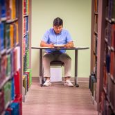 A student studies in a library