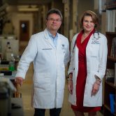 Man and woman in white lab coats