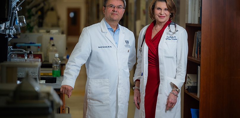Man and woman in white lab coats