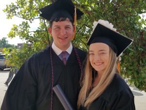 Hornsby's son Zach at graduation with friend Katie
