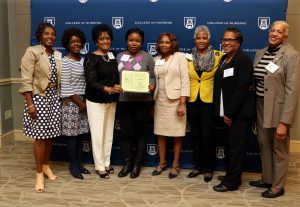 Trailblazers pose with 2017 scholarship recipient