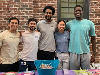 Volunteers at The HUB Back to school bash