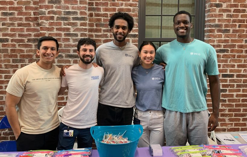 Volunteers at The HUB Back to school bash