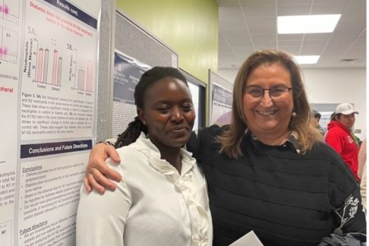 Sheila Ngumbi (BCB) with her mentor, Dr. Manuela Bartoli, at the GRD 2024 Poster Session