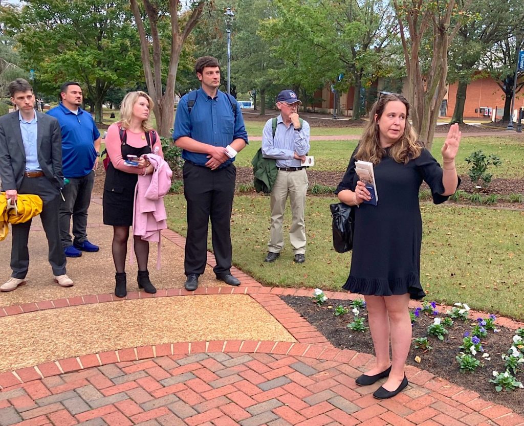 AU Department of History's Stacey Thompson (R) leads participants in the Symposium on the 19th Century Press, the Civil War, and Free Expression on a tour of the Summerville Campus. (photo by David Bulla)