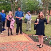 AU Department of History's Stacey Thompson (R) leads participants in the Symposium on the 19th Century Press, the Civil War, and Free Expression on a tour of the Summerville Campus. (photo by David Bulla)