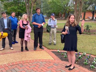 AU Department of History's Stacey Thompson (R) leads participants in the Symposium on the 19th Century Press, the Civil War, and Free Expression on a tour of the Summerville Campus. (photo by David Bulla)