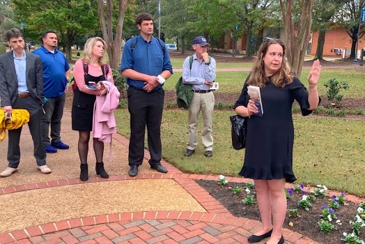 AU Department of History's Stacey Thompson (R) leads participants in the Symposium on the 19th Century Press, the Civil War, and Free Expression on a tour of the Summerville Campus. (photo by David Bulla)