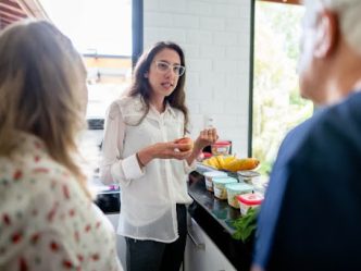 A public health nutritionist discusses a healthy meal plan with a couple.