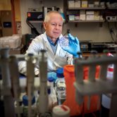 Dr. Andrew Yeudall in his lab.