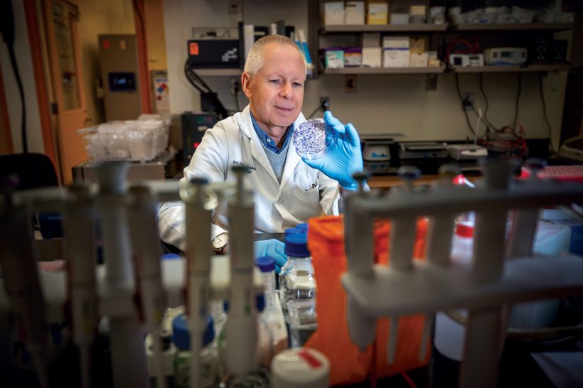 Dr. Andrew Yeudall in his lab.