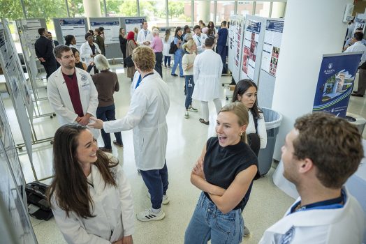 People share results of their research with one another