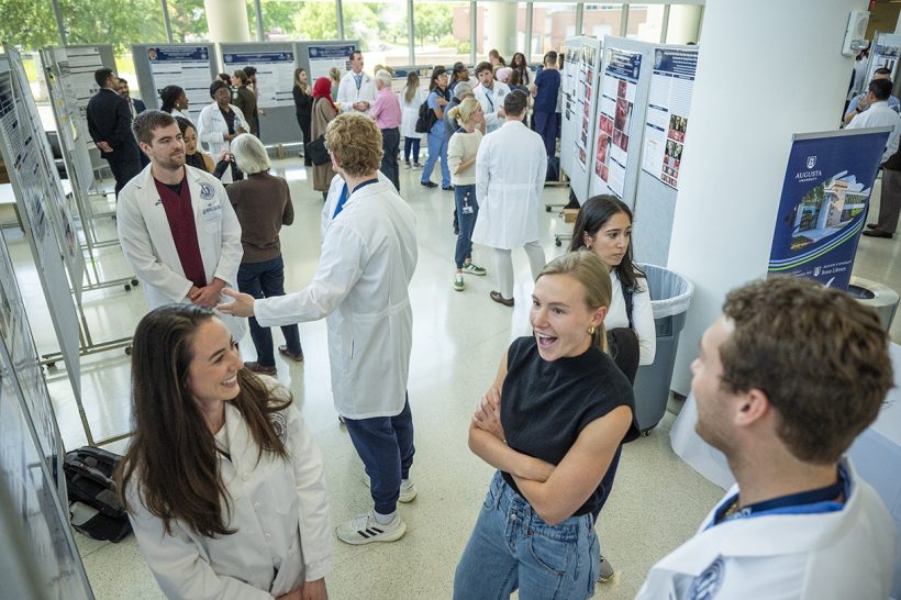 People share results of their research with one another