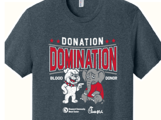 T-shirt that will be given to blood donors, showing Georgia Bulldog laughing at a sad elephant and the words Donation Domination / Blood Donor
