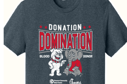 T-shirt that will be given to blood donors, showing Georgia Bulldog laughing at a sad elephant and the words Donation Domination / Blood Donor