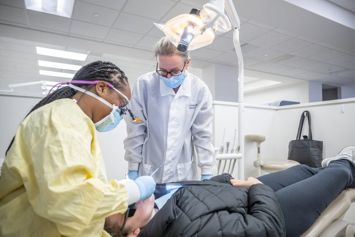 Dental Hygienist working