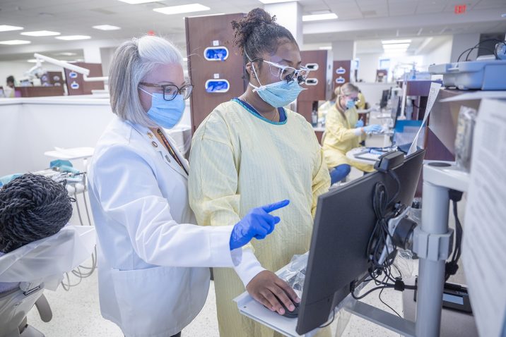 Dental Hygienist working