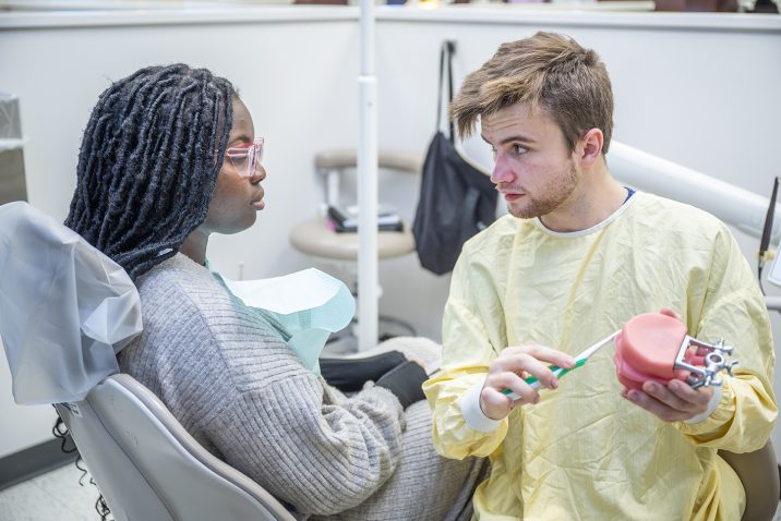 Dental Hygienist working