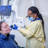 Dental Hygienist working