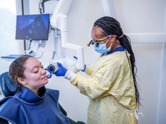 Dental Hygienist working