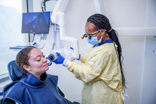 Dental Hygienist working