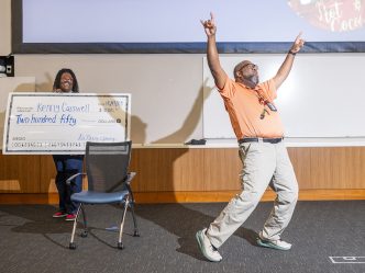 Kenneth Carswell celebrates winning the Sherry Barnett Award.
