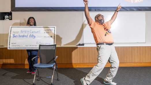 Kenneth Carswell celebrates winning the Sherry Barnett Award.