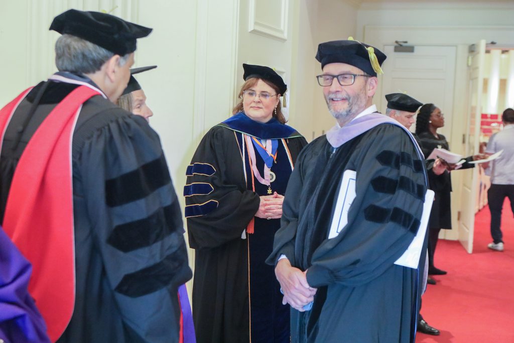 Scene from 2026 hooding ceremony at Dental College of Georgia
