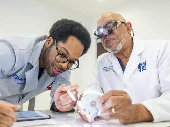 (L-R) Wesley Clark and Dr. Maurice Lewis work in the Simulation Lab at the DCG Building on the Augusta University Health Sciences campus in Augusta Ga.