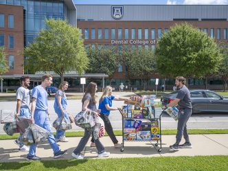 students push cart