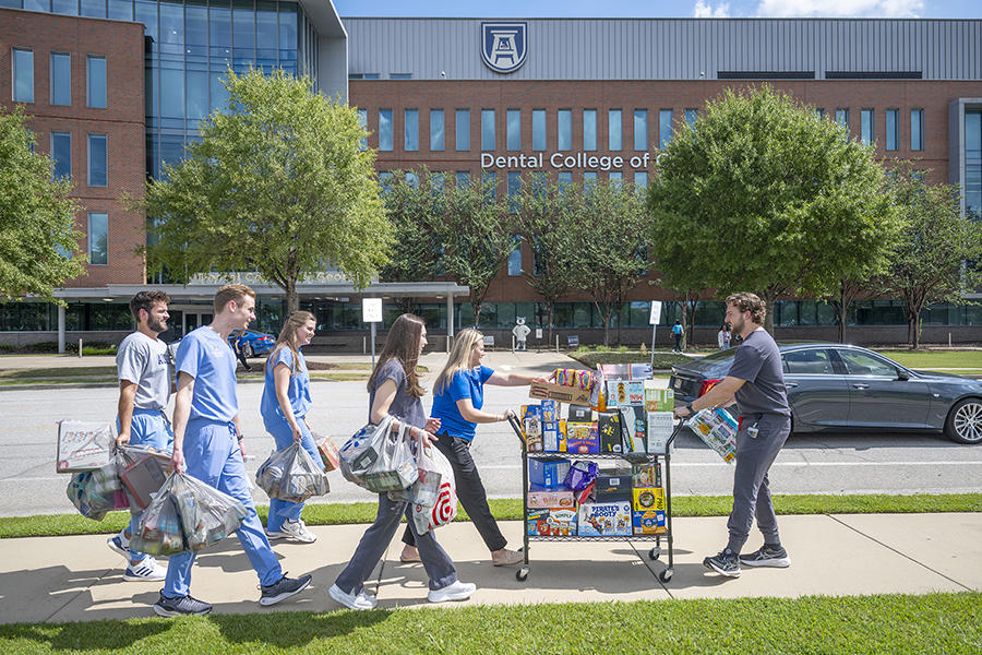 students push cart