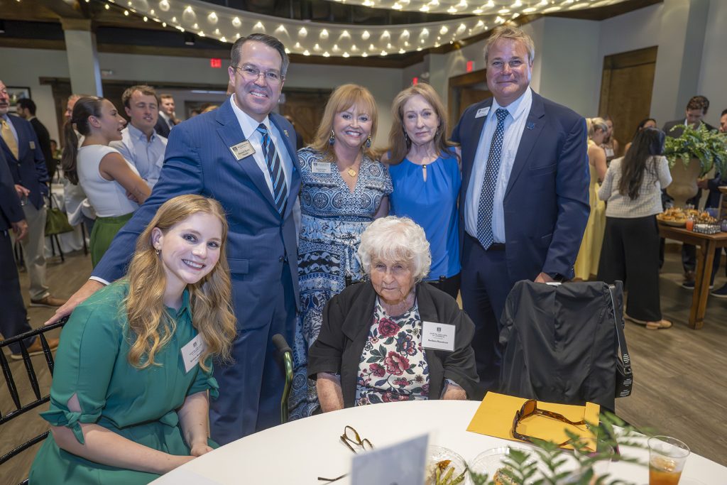 Attendees enjoy hors d'oeuvres and drinks while catching up with colleagues and celebrating scholarship winners.