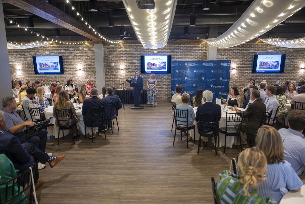 Attendees enjoy hors d'oeuvres and drinks while catching up with colleagues and celebrating scholarship winners.