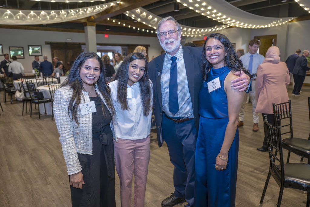 Attendees enjoy hors d'oeuvres and drinks while catching up with colleagues and celebrating scholarship winners.