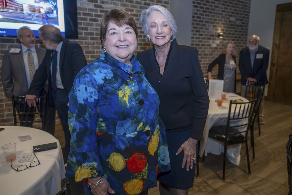 Attendees enjoy hors d'oeuvres and drinks while catching up with colleagues and celebrating scholarship winners.