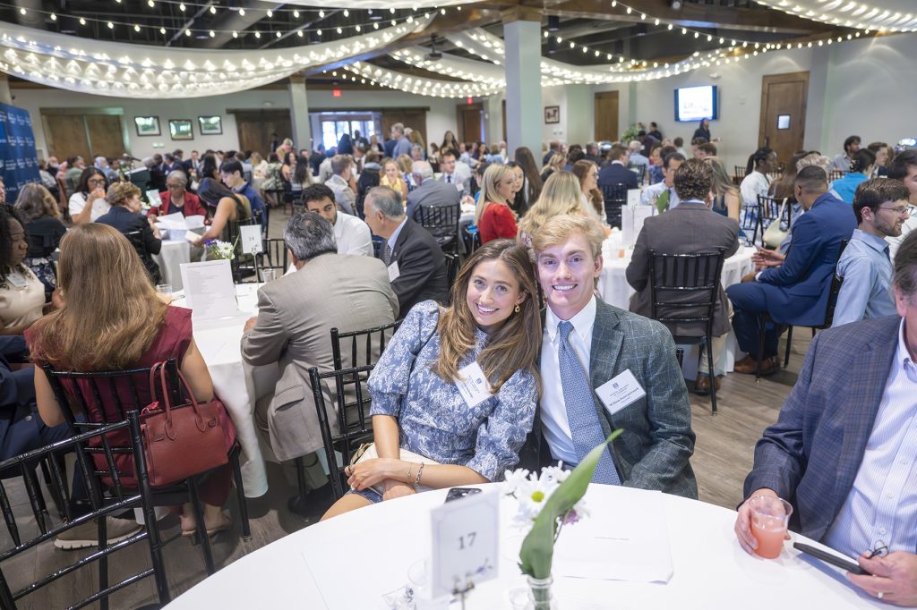Attendees enjoy hors d'oeuvres and drinks while catching up with colleagues and celebrating scholarship winners.
