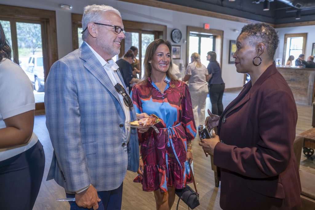 Attendees enjoy hors d'oeuvres and drinks while catching up with colleagues and celebrating scholarship winners.