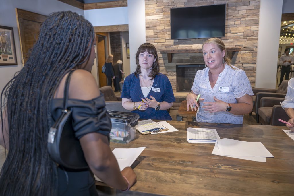 Attendees enjoy hors d'oeuvres and drinks while catching up with colleagues and celebrating scholarship winners.