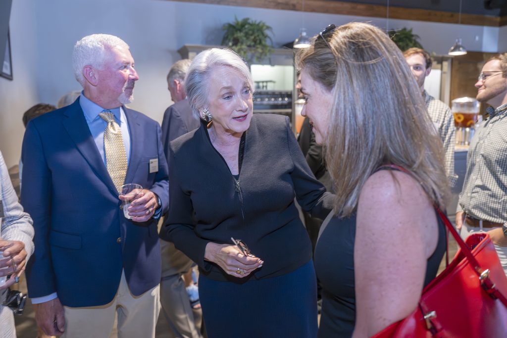 Attendees enjoy hors d'oeuvres and drinks while catching up with colleagues and celebrating scholarship winners.