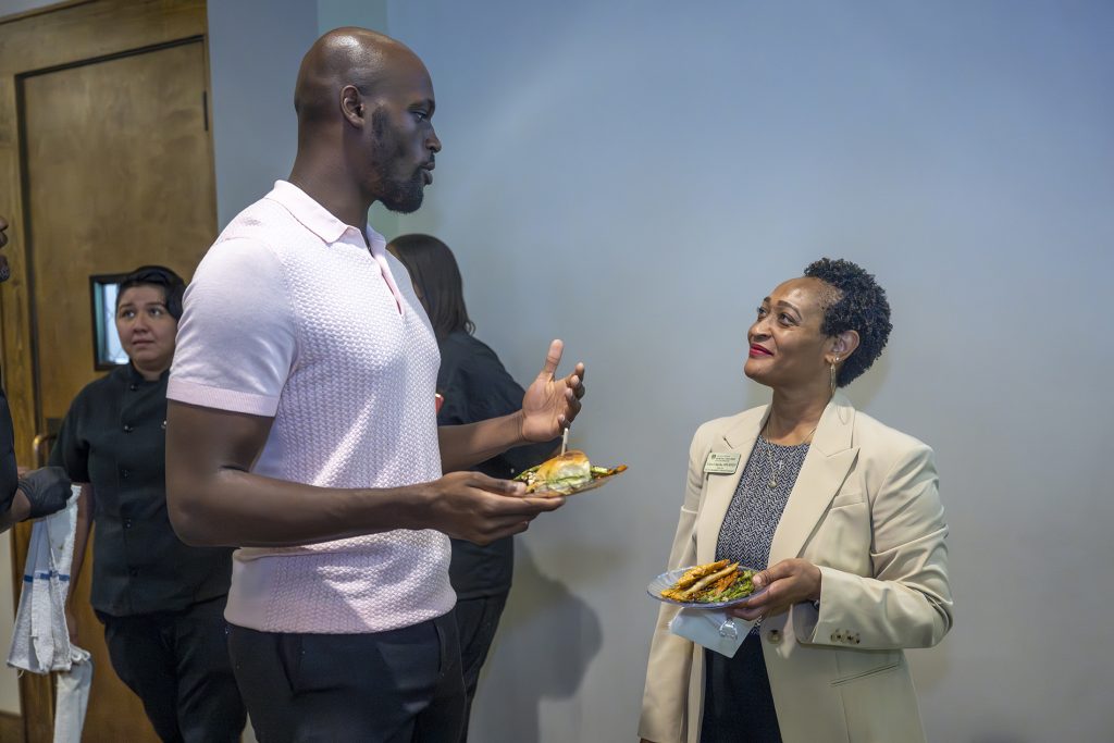 Attendees enjoy hors d'oeuvres and drinks while catching up with colleagues and celebrating scholarship winners.