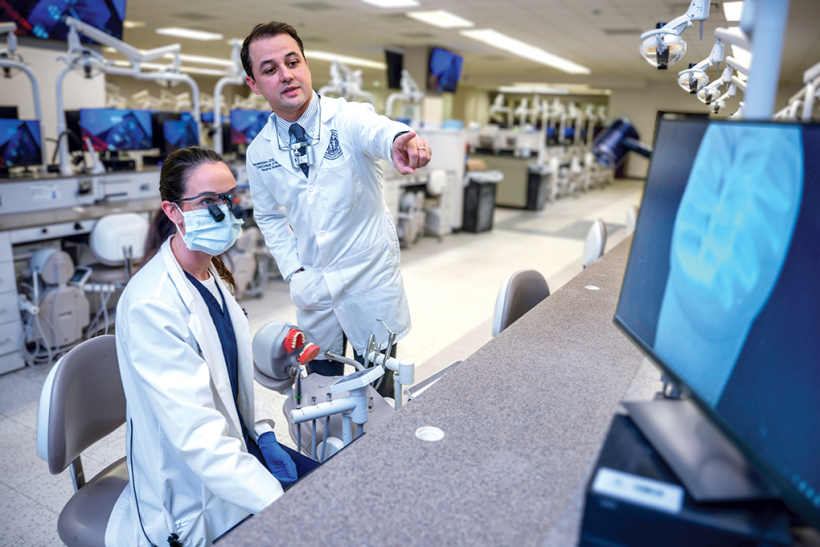 Dental professor teaches in lab